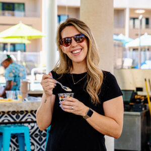 A women standing outside in a black dress
